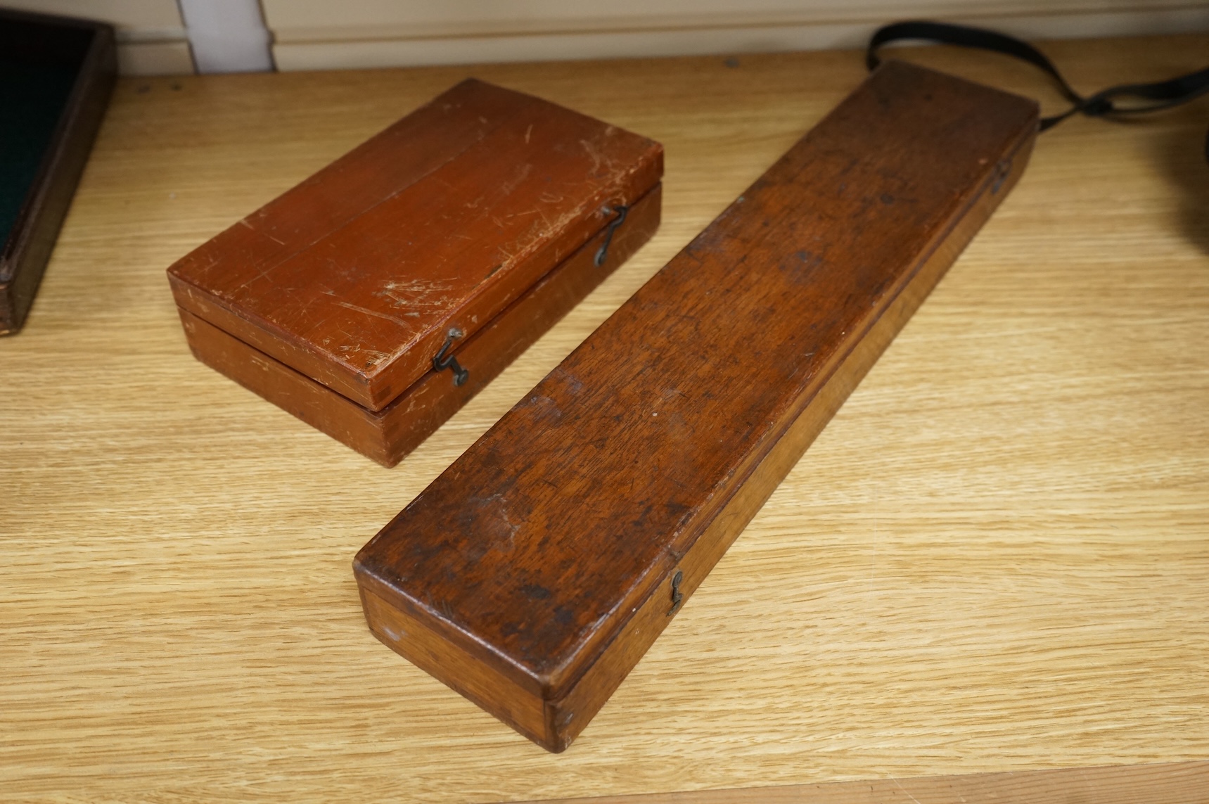 An early 20th century teak cased Stuart's Distance Meter and a late 19th century mahogany cased ‘Capt. Field’s Improved’ protractor by Gieves Ltd., 21 Old Bond Street W.1.